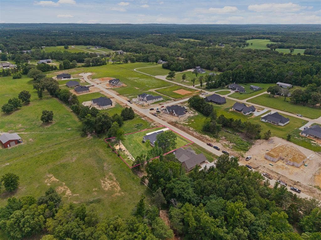 13914 Cedar Hill Lane, Tyler, TX 75704 Expansive lot with partial tree coverage, surrounded by a developing neighborhood with established and under-construction residences