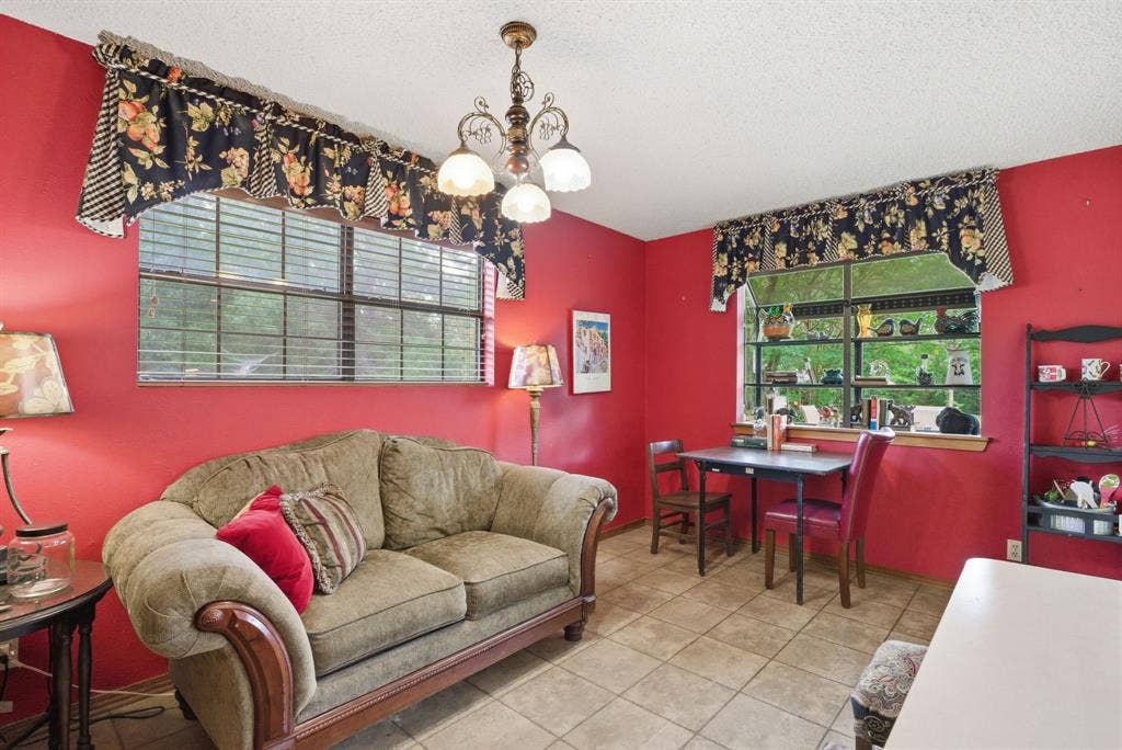 6146 County Road 334, Tyler, TX 75708 Tile flooring, multiple windows providing natural illumination, and a ceiling-mounted light fixture