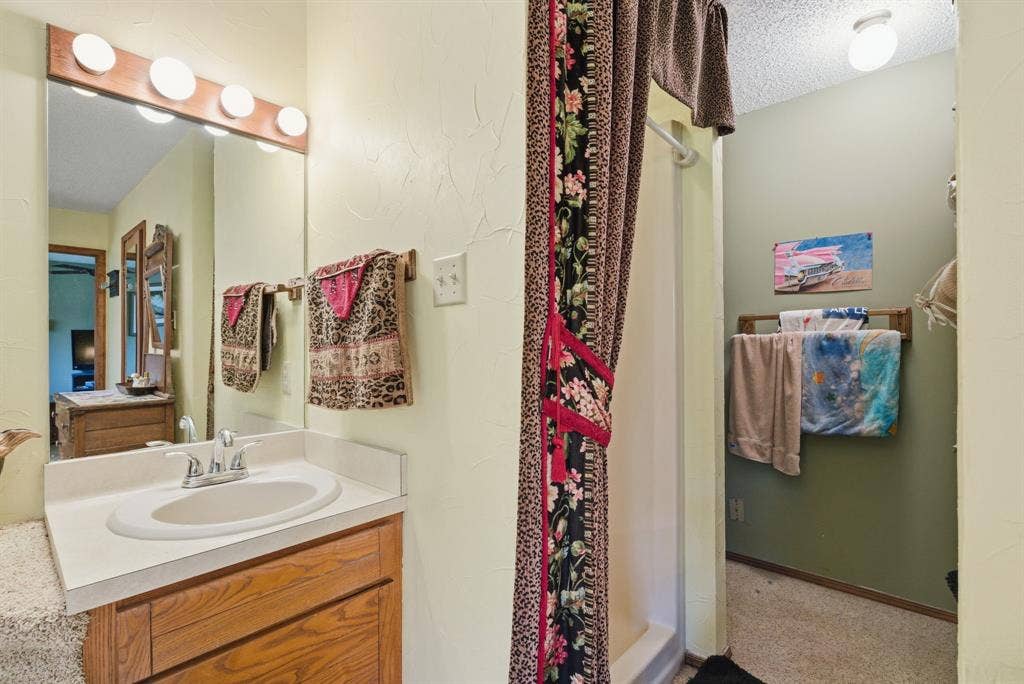 6146 County Road 334, Tyler, TX 75708 Vanity with an integrated sink and chrome fixtures
