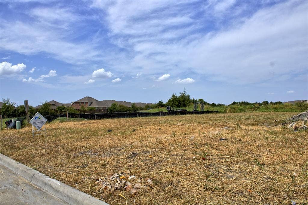 4007 Yellow Jasmine Lane, Heath, TX 75126 Open lot with visible curb and street