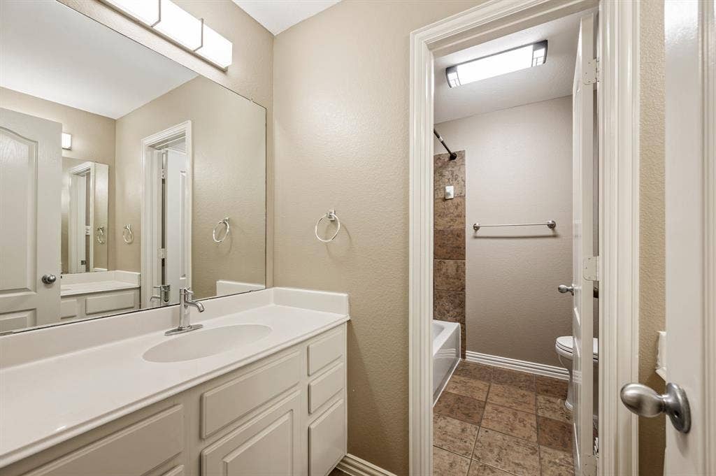 6201 Crator Drive, McKinney, TX 75070 Guest Bathroom upstairs with separated areas