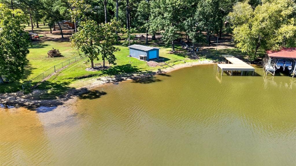 21165 Charina Circle, Chandler, TX 75758 Waterfront beach with onland boat house