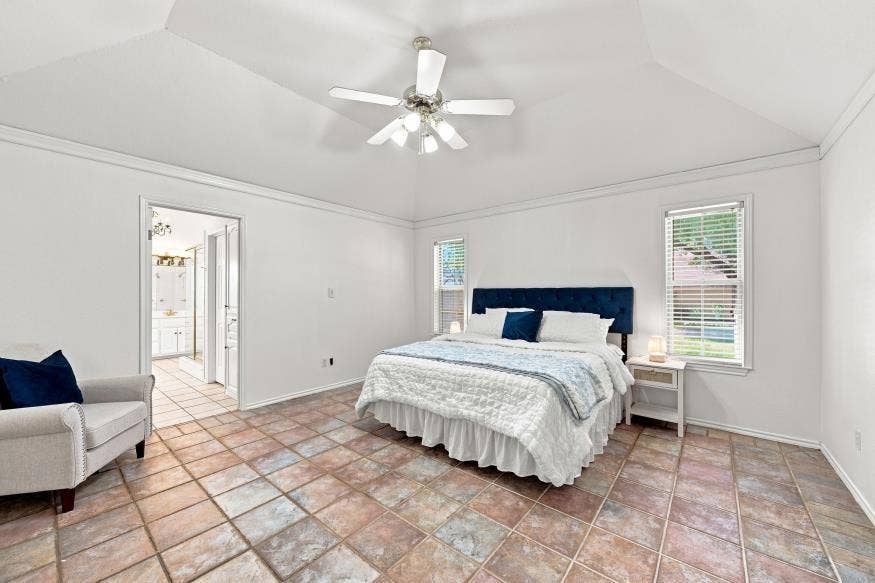 512 Meadowland Drive, Waco, TX 76657 Vaulted ceiling with a ceiling fan, white window blinds, and tile flooring