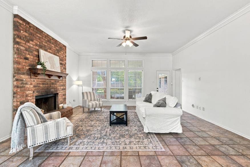512 Meadowland Drive, Waco, TX 76657 Brick-faced fireplace with a wood mantel