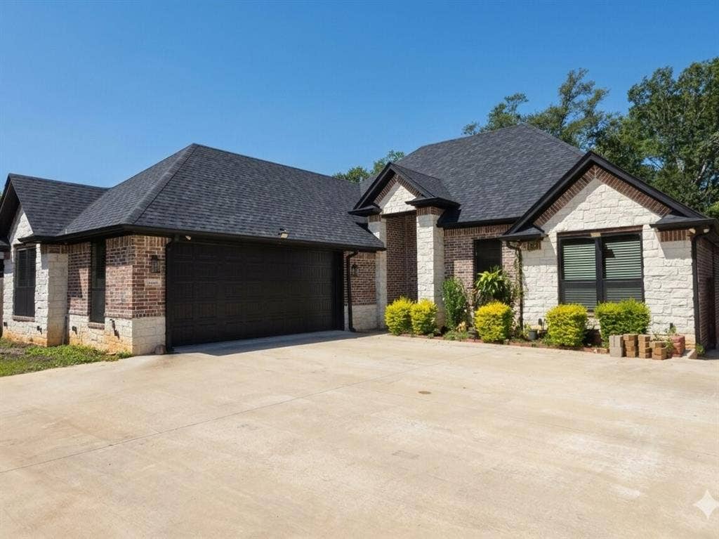 11034 Oak Springs Cove, Tyler, TX 75703 Brick and stone exterior with dark shingles