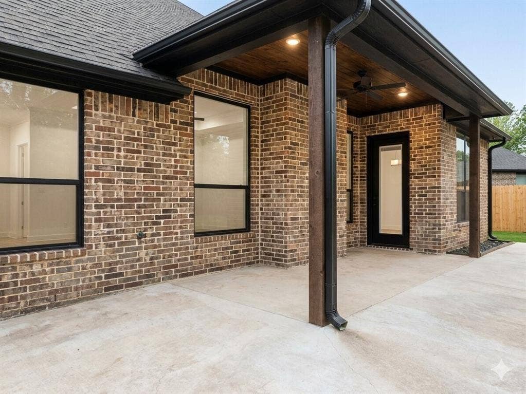 11034 Oak Springs Cove, Tyler, TX 75703 Covered patio featuring brick exterior, wood-paneled ceiling, recessed lighting, and a ceiling fan