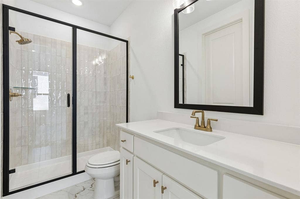1820 Vetiver Glow Drive, Celina, TX 75009 Guests will love getting ready in any of the gorgeous guest baths featured in this outstanding home!
