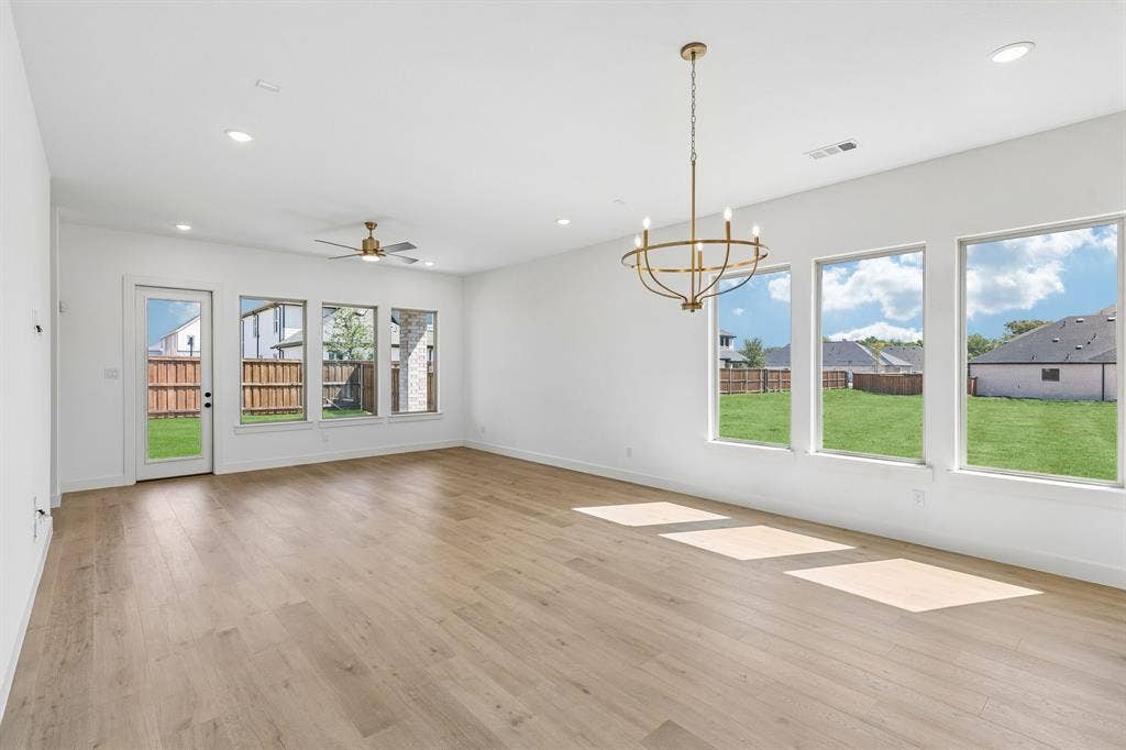 1820 Vetiver Glow Drive, Celina, TX 75009 Whether it's lively dinner parties or cozy family gatherings, this dining area fits all occasions!