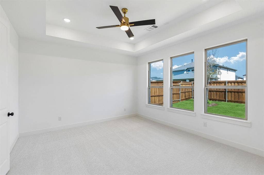 1820 Vetiver Glow Drive, Celina, TX 75009 This peaceful light filled owner's bedroom is the perfect place to relax after a long day.