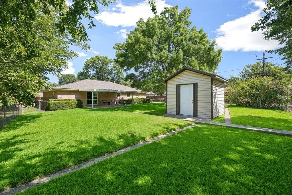 2546 Telegraph Avenue, Dallas, TX 75228 Grass plus two sheds