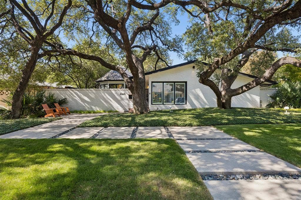The home exudes character, charm and warmth in this architecturally desticintive style.