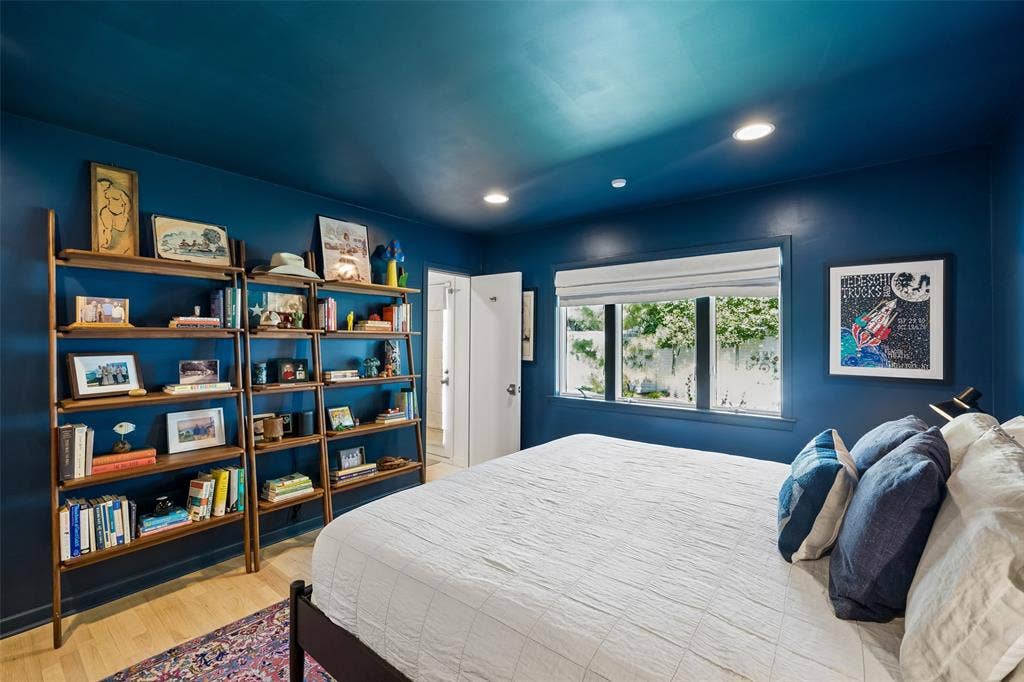 Guest bedroom with views of the backyard.