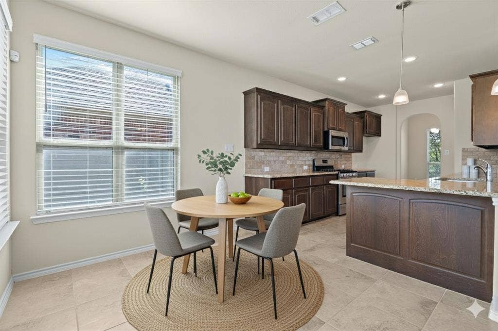 1704 Sparrow Street, Argyle, TX 76226 virtually staged eat-in kitchen