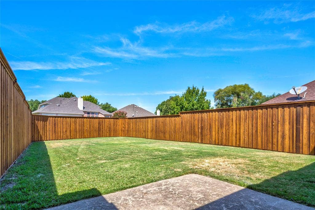 3408 Loblolly Lane, McKinney, TX 75070 Flat, grassy yard and August 2026 8-foot board-on-board cedar fence!