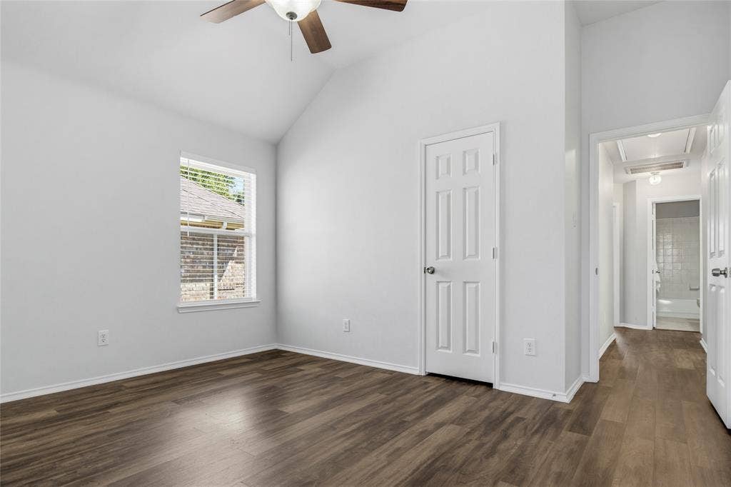 3408 Loblolly Lane, McKinney, TX 75070 Bedroom 4 - view looking down hallway from doorway into living room.