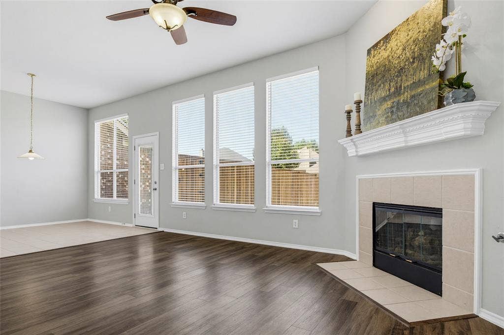 3408 Loblolly Lane, McKinney, TX 75070 Large windows allow natural light to filter in.