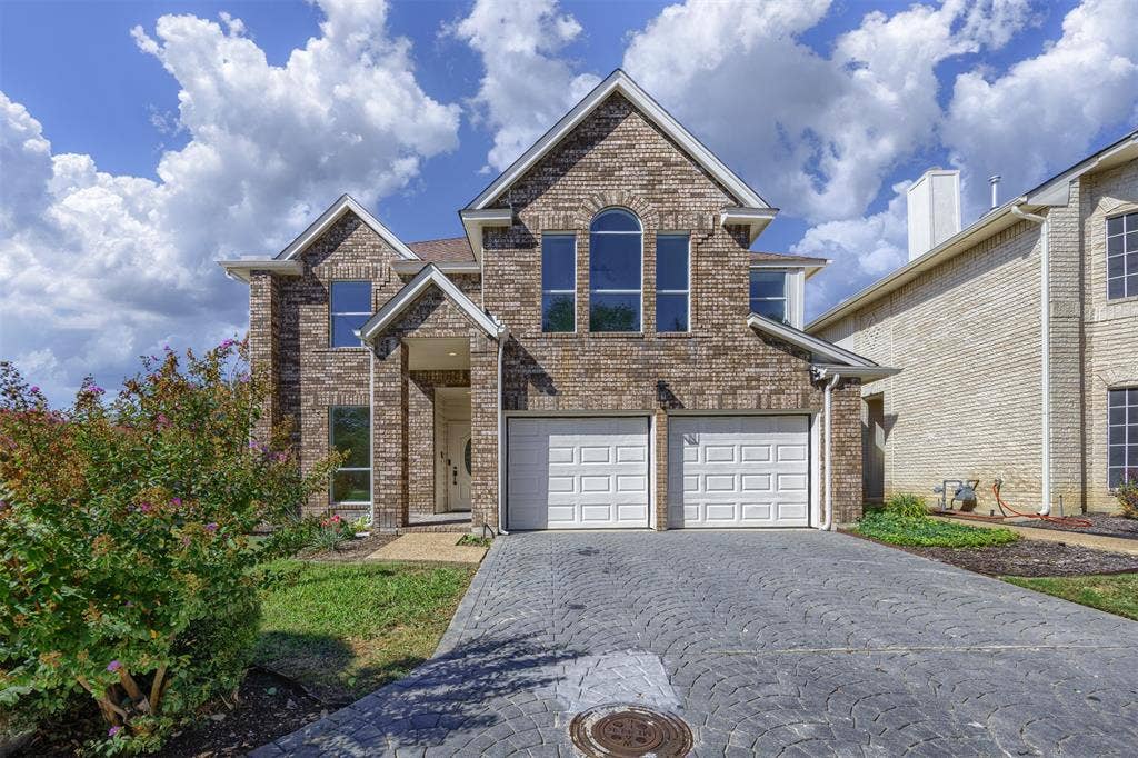 4203 N Capistrano Drive, Dallas, TX 75287 The two garage doors have Chamberlain quiet belt drive, two remote openers and one exterior keypad for each door, interior motion lighting with bluetooth cameras.