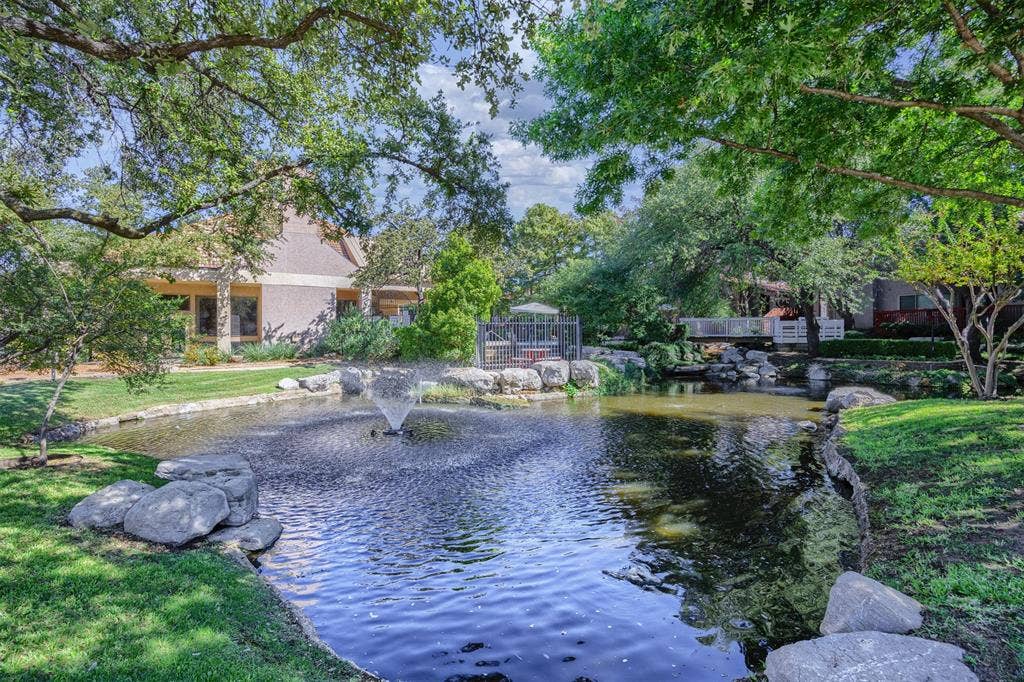 4203 N Capistrano Drive, Dallas, TX 75287 Pond and water feature adjacent to community pool.