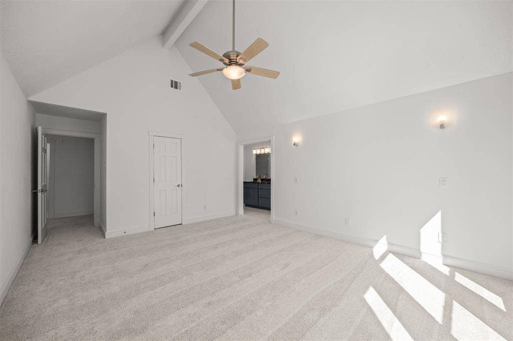 4203 N Capistrano Drive, Dallas, TX 75287 Photograph taken from front bedroom wall looking back toward entry door, walk-in closet door and master bath. New Shaw carpet/pad installed on stairs and in all bedrooms.