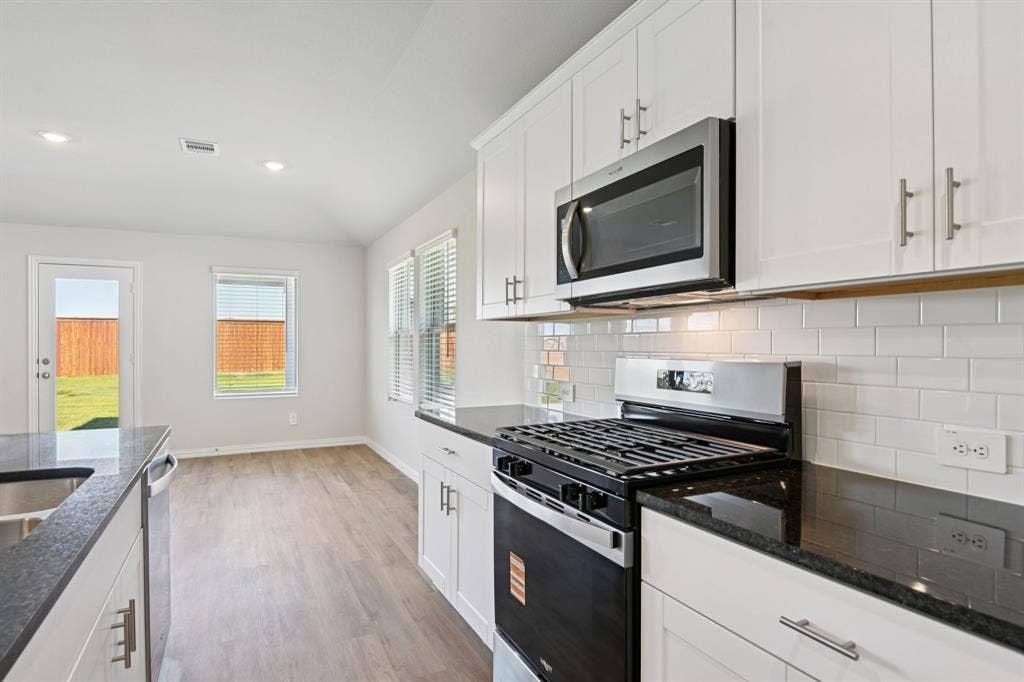 1581 Coldwater Way, Crandall, TX 75114 Photo is not of the actual home, but is an inspirational photo of builder’s model home and may depict options, furnishings, and/or decorator features that are not included.