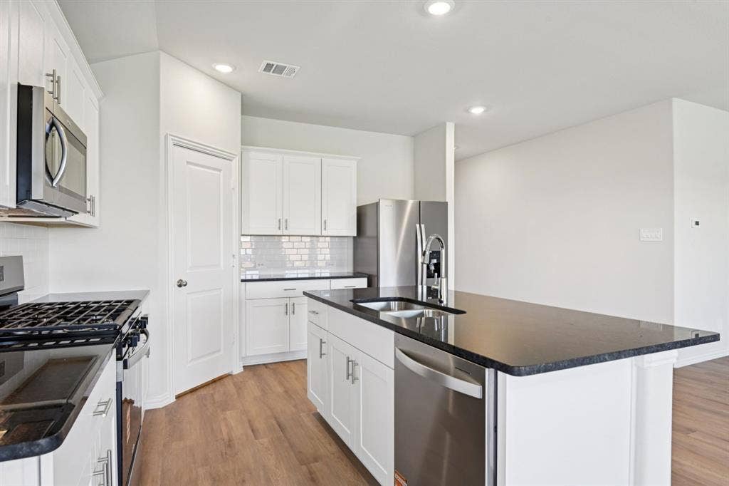 1581 Coldwater Way, Crandall, TX 75114 Photo is not of the actual home, but is an inspirational photo of builder’s model home and may depict options, furnishings, and/or decorator features that are not included.