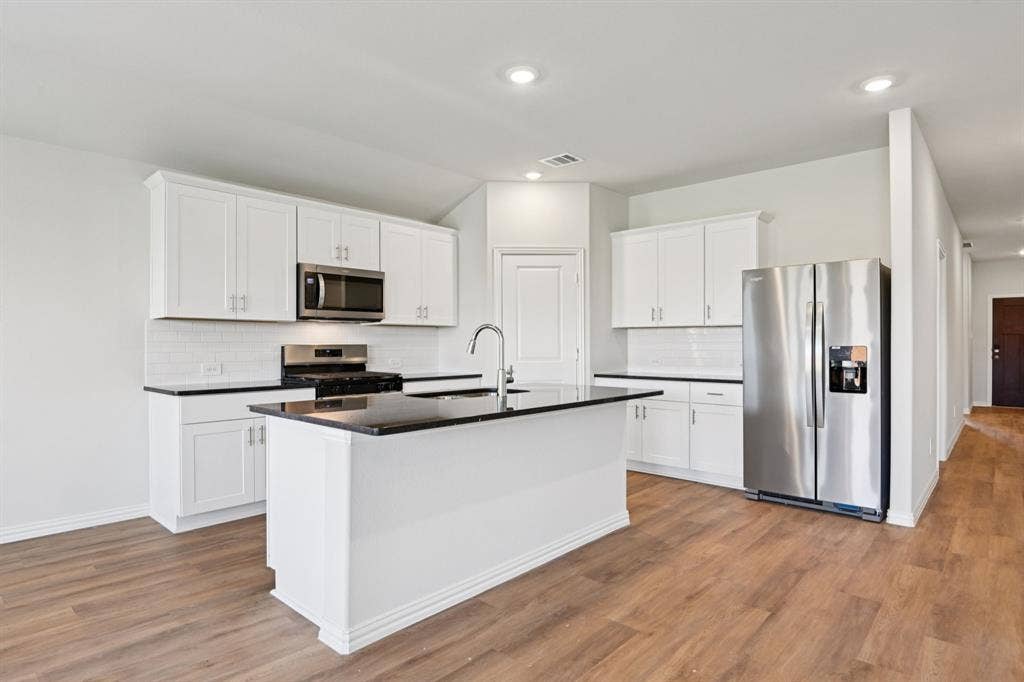1581 Coldwater Way, Crandall, TX 75114 Photo is not of the actual home, but is an inspirational photo of builder’s model home and may depict options, furnishings, and/or decorator features that are not included.
