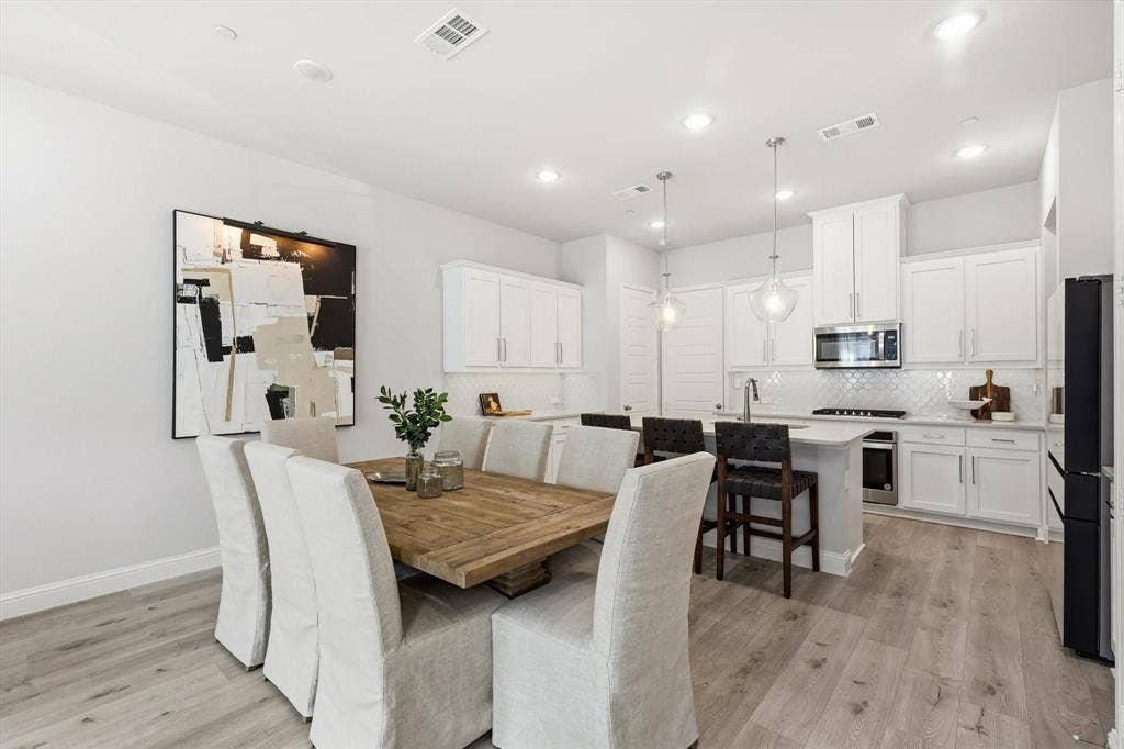 12952 Wymeth Drive, Farmers Branch, TX 75234 Open-concept dining area and kitchen