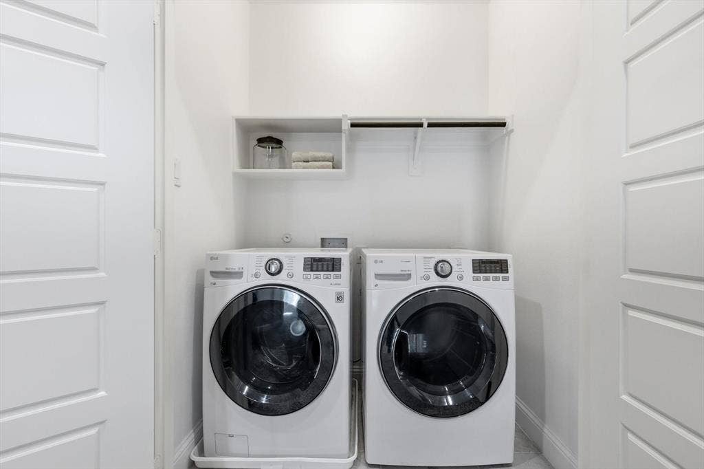 12952 Wymeth Drive, Farmers Branch, TX 75234 Laundry closet with built-in shelving and hanging rod
