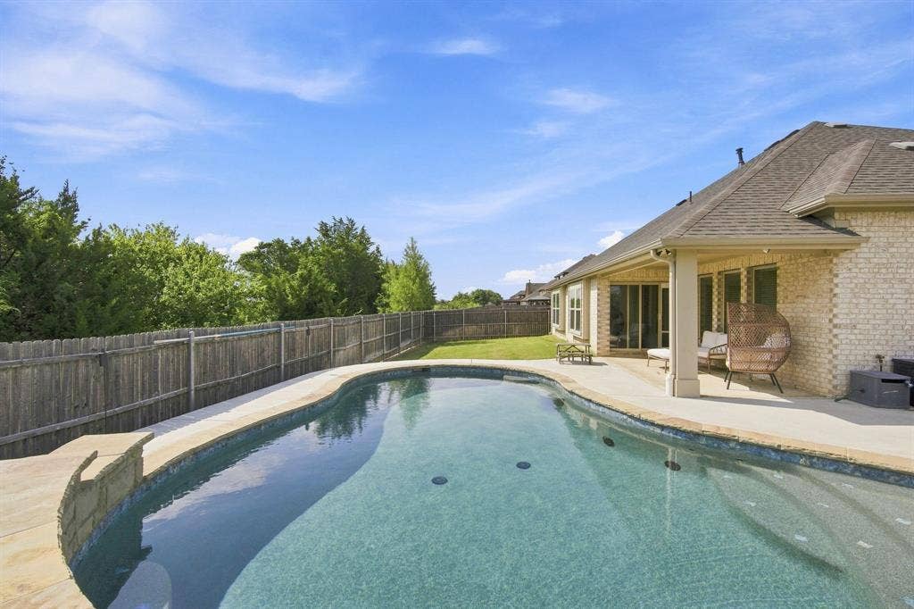 A well-maintained pool is a prime feature in this home