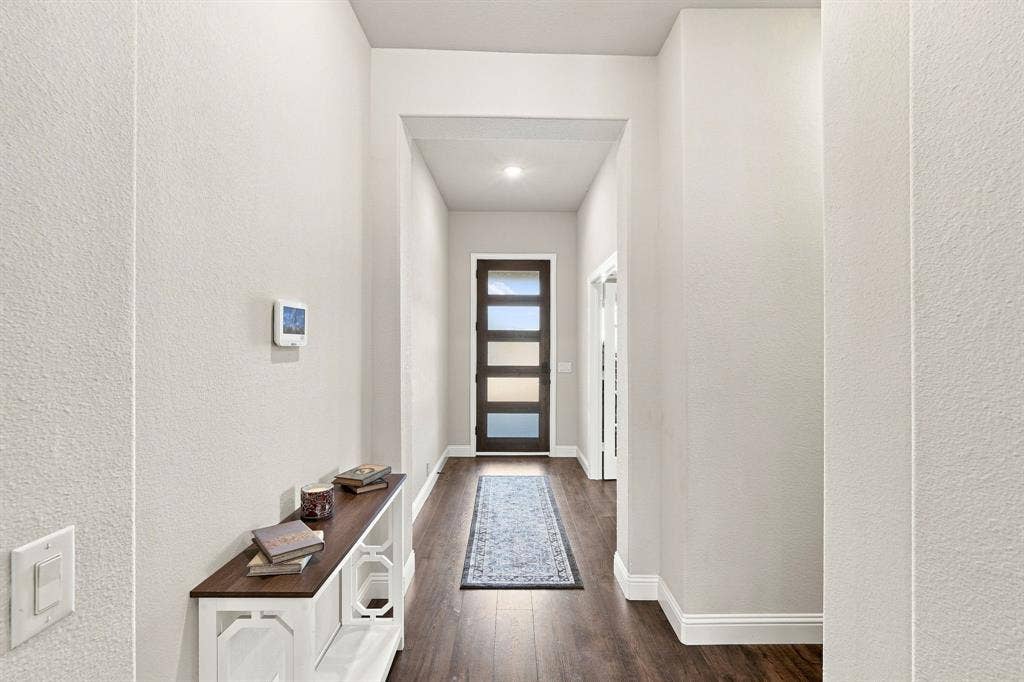Step inside to a sophisticated open floor plan with a well-located and convenient home office