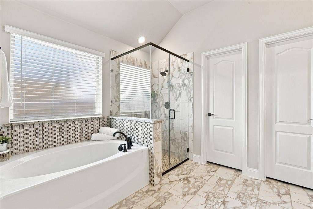 Your spa-like primary bathroom is sure to offer relaxing moments