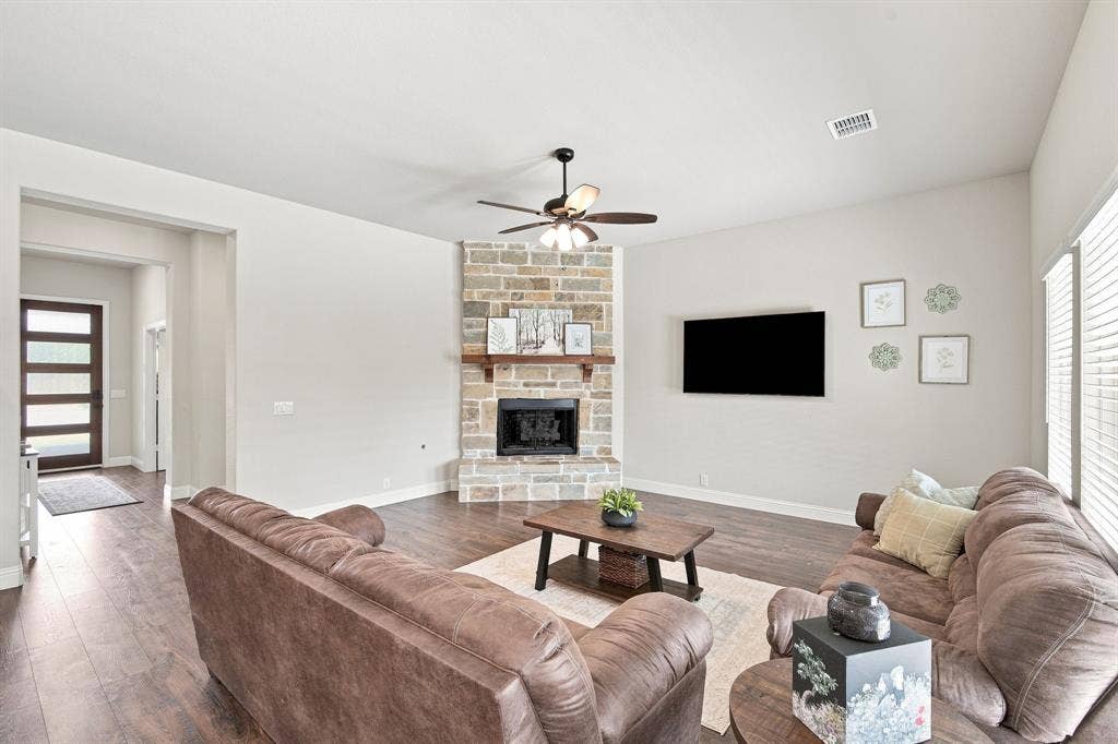 Open floor plan filled with natural light and upscale finishes