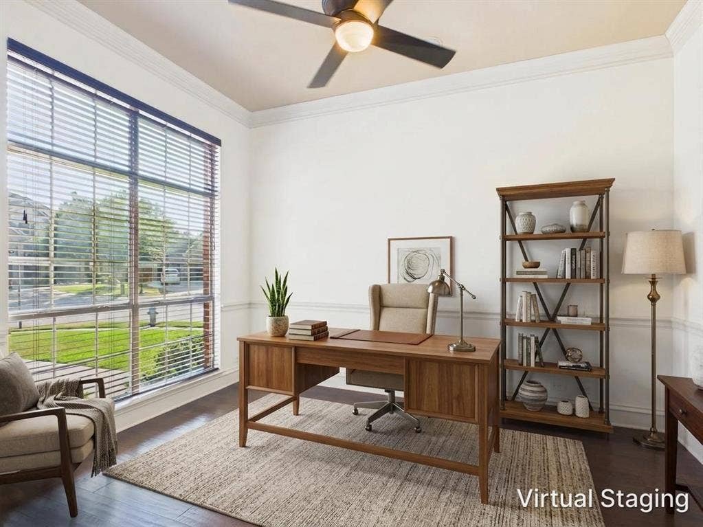 Study is at the entry with french doors overlooking front driveway