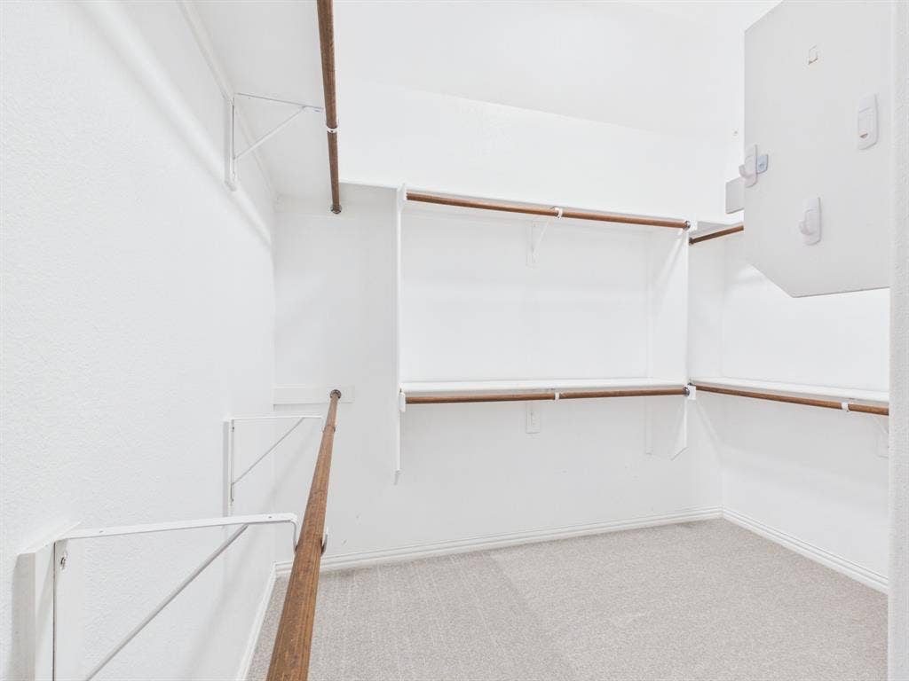 Large walk in closet in Primary