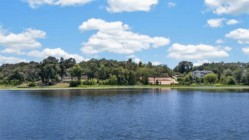 4513 Cascades Shoreline Drive, Tyler, TX 75709 Waterfront property with mature trees and partially cleared land