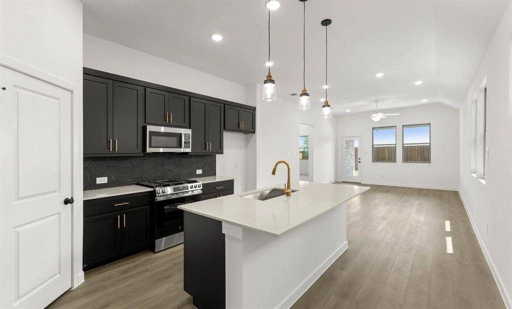 3643 Castle Drive, Celina, TX 75009 Open Kitchen-Living-Dining Room Representative Photo featuring the Noir Collection