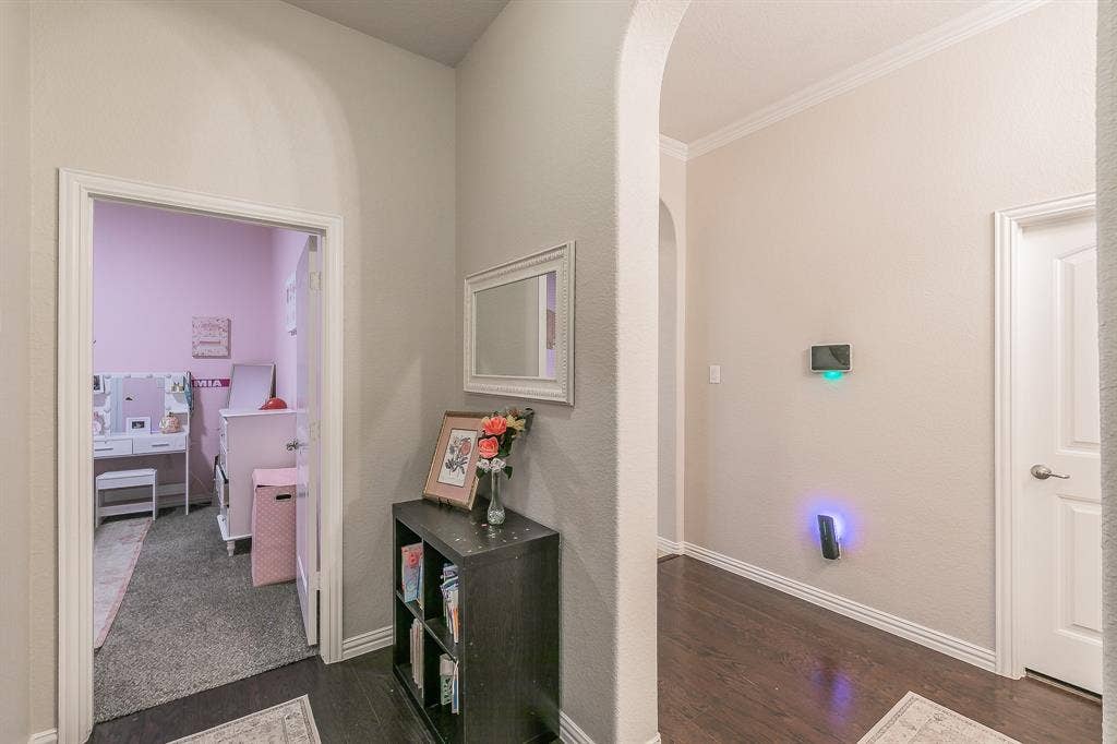 3020 Bella Lago Drive, Fort Worth, TX 76177 Arched entryway with wood-finish flooring and white trim