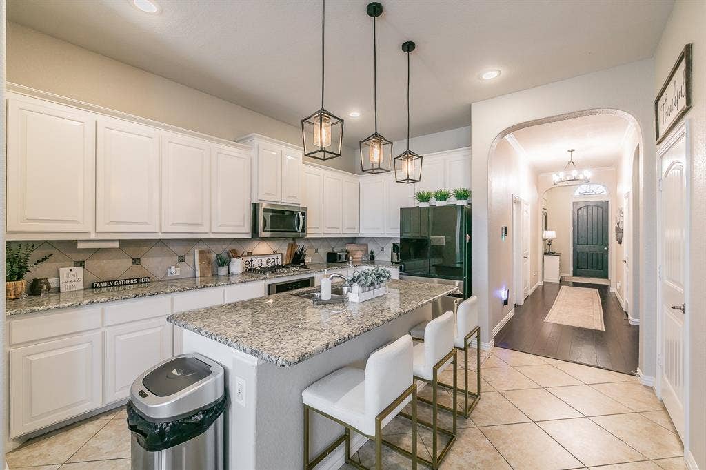 3020 Bella Lago Drive, Fort Worth, TX 76177 View from kitchen to front door, wide open concept with lots of counter space.