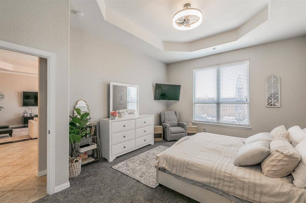 3020 Bella Lago Drive, Fort Worth, TX 76177 Recessed ceiling with a modern ceiling fan and light fixture