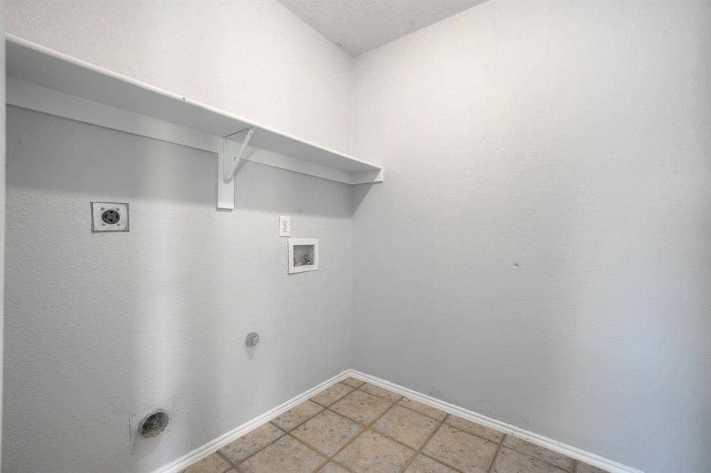 Utility connections, integrated shelving, and tile flooring