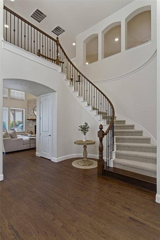 2801 Seabiscuit Road, Celina, TX 75009 Stunning entry with curved staircase and hardwood floors.