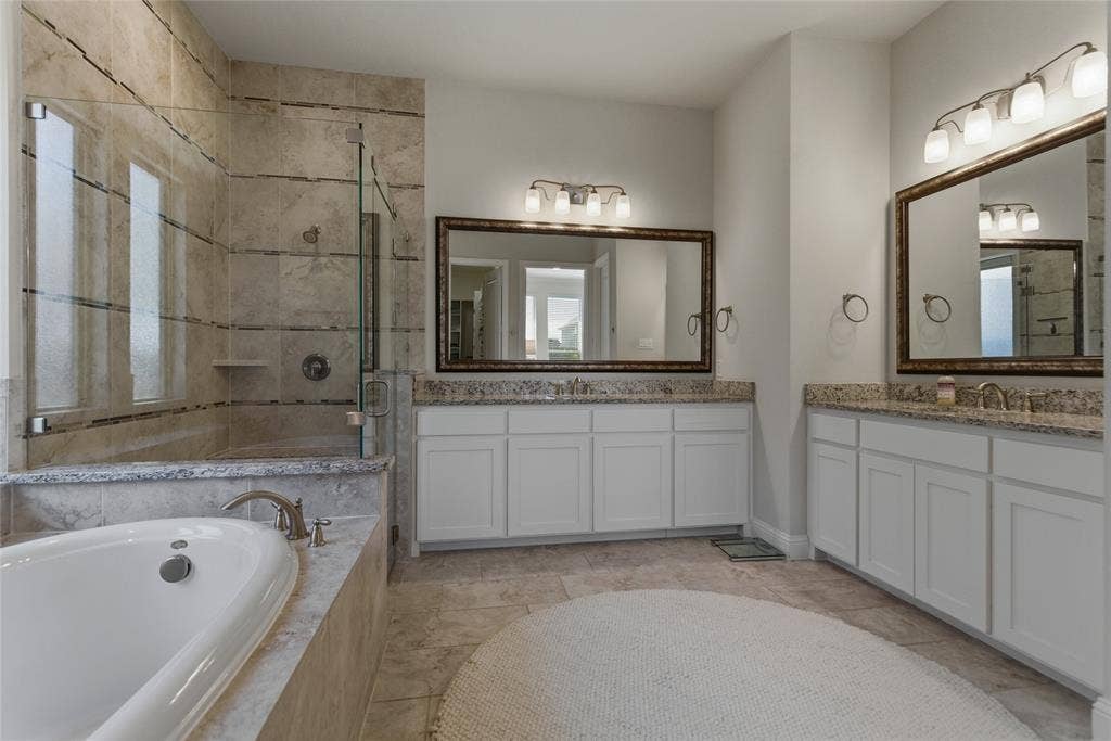 2801 Seabiscuit Road, Celina, TX 75009 Spacious primary bath with garden tub and separate vanities