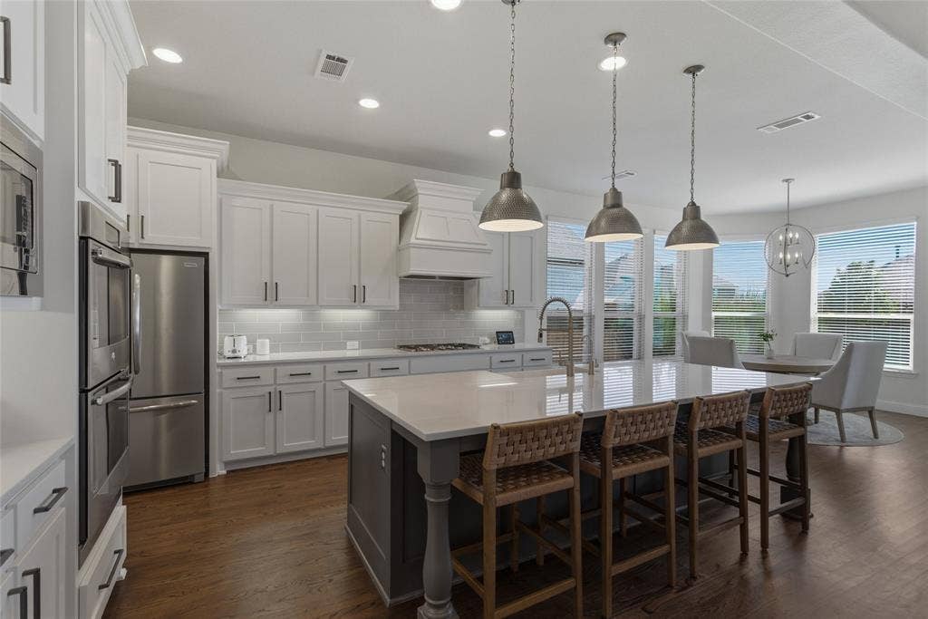 2801 Seabiscuit Road, Celina, TX 75009 This island is the centerpiece of the grand room