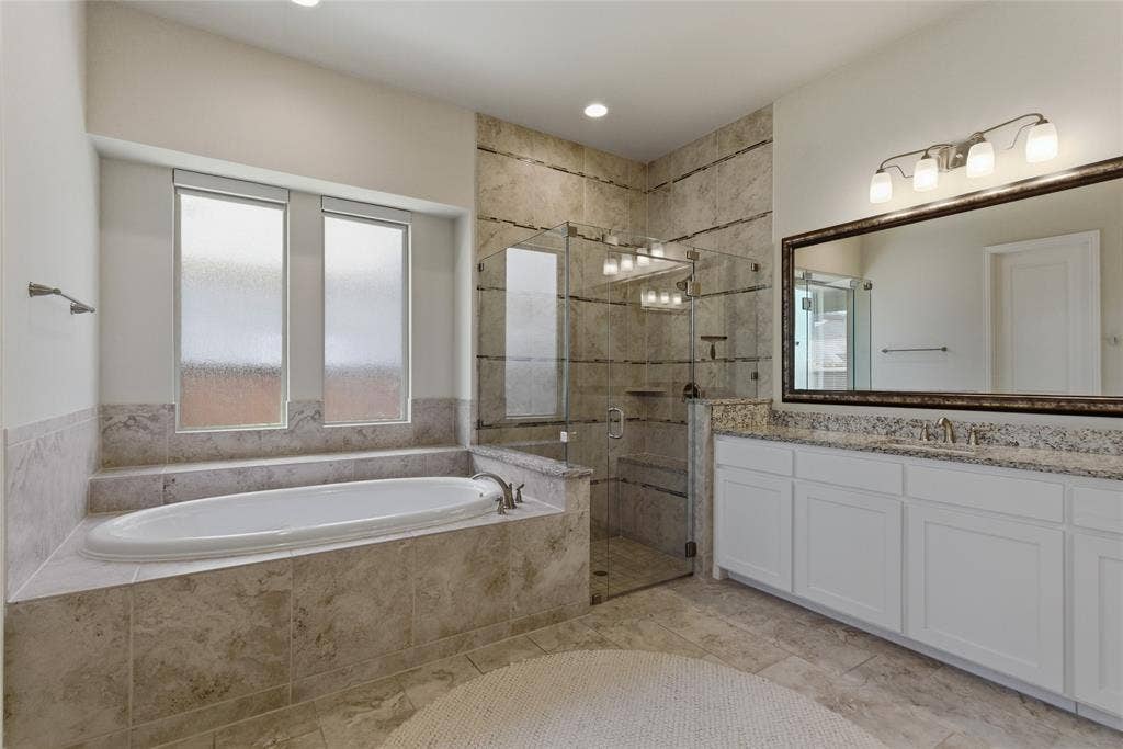 2801 Seabiscuit Road, Celina, TX 75009 Spacious primary bath with garden tub and separate vanities