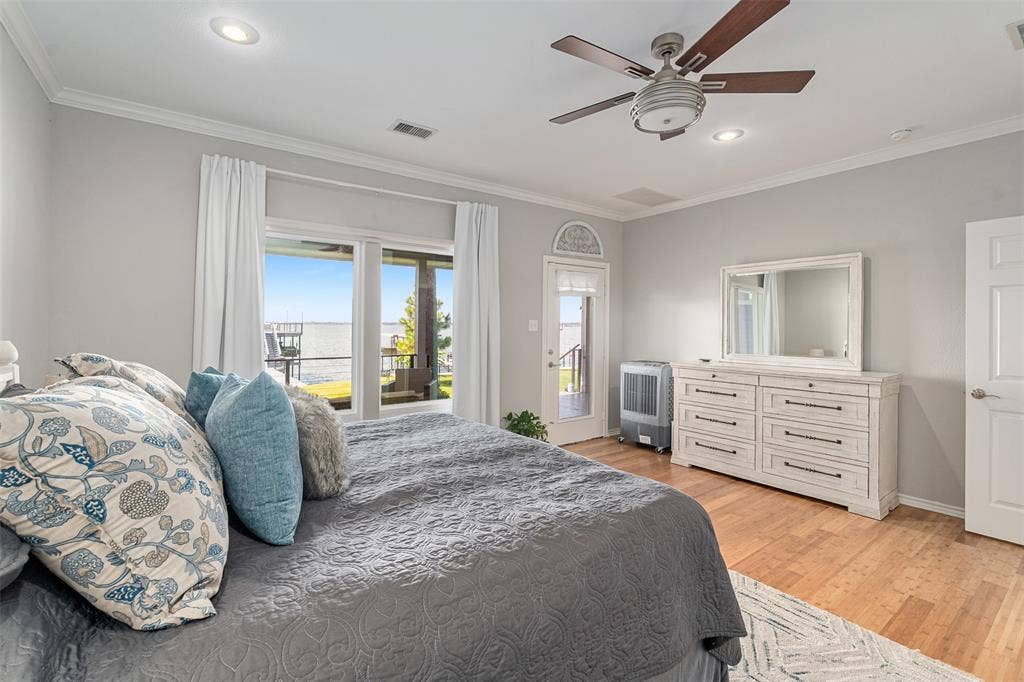 109 Briarwood Drive, Gun Barrel City, TX 75156 bamboo flooring, recessed lighting, ceiling fan, crown molding, and glass panel door