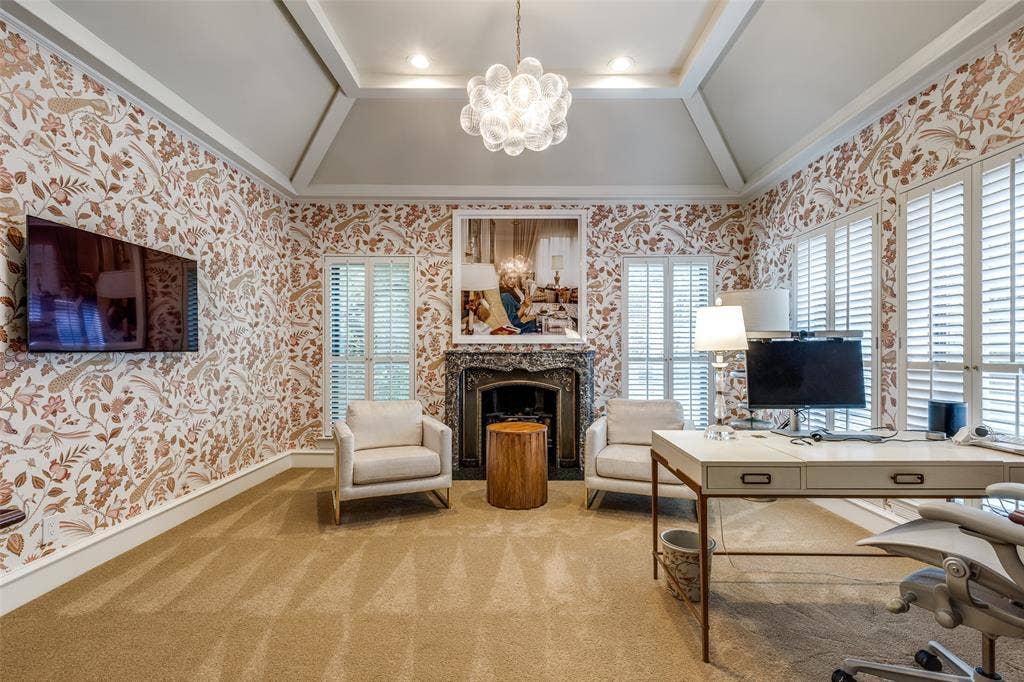 17316 Club Hill Lane, Dallas, TX 75248 This flexible primary suite room offers thoughtful lighting, designer wallpaper, and a warm fireplace. This could be used as an additional sitting room, exercise room or office.