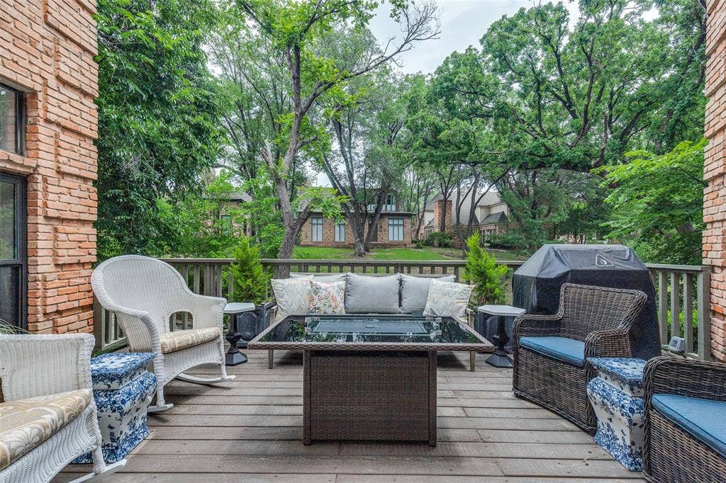 17316 Club Hill Lane, Dallas, TX 75248 Tree-lined creekside deck just steps off the living room, study and breakfast room that offers a quiet, natured framed spot to relax or entertain.
