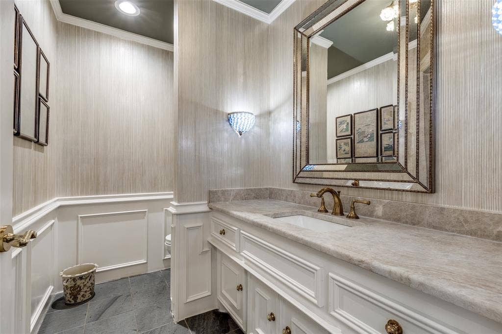 17316 Club Hill Lane, Dallas, TX 75248 Off the foyer, one of 2 half baths.