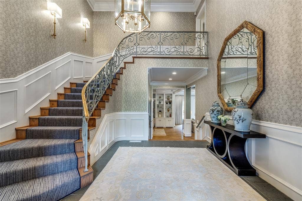 17316 Club Hill Lane, Dallas, TX 75248 Dramatic high ceilings and striking designer wallpaper greet you in the grand foyer.