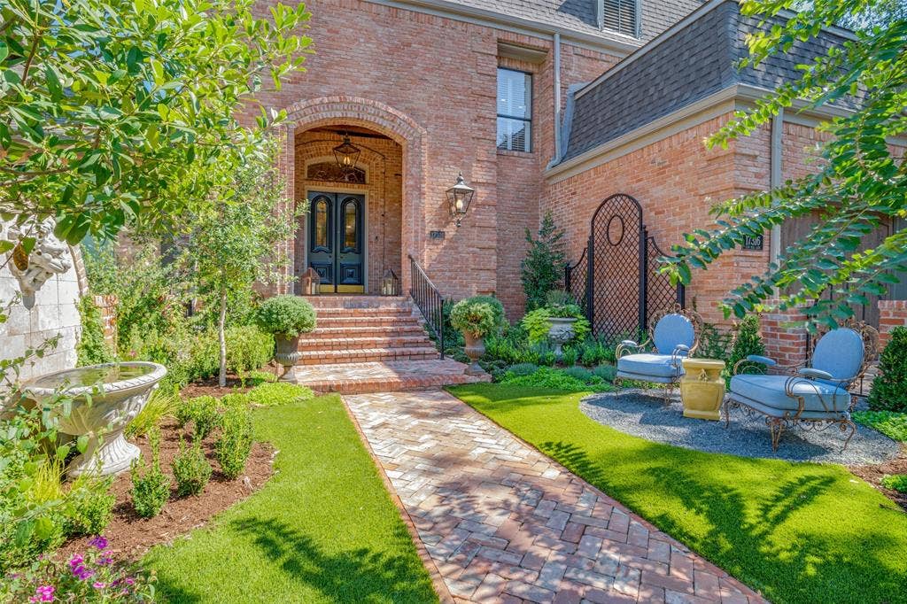 17316 Club Hill Lane, Dallas, TX 75248 Welcoming entry garden with turf, lush landscape, sitting area and fountain